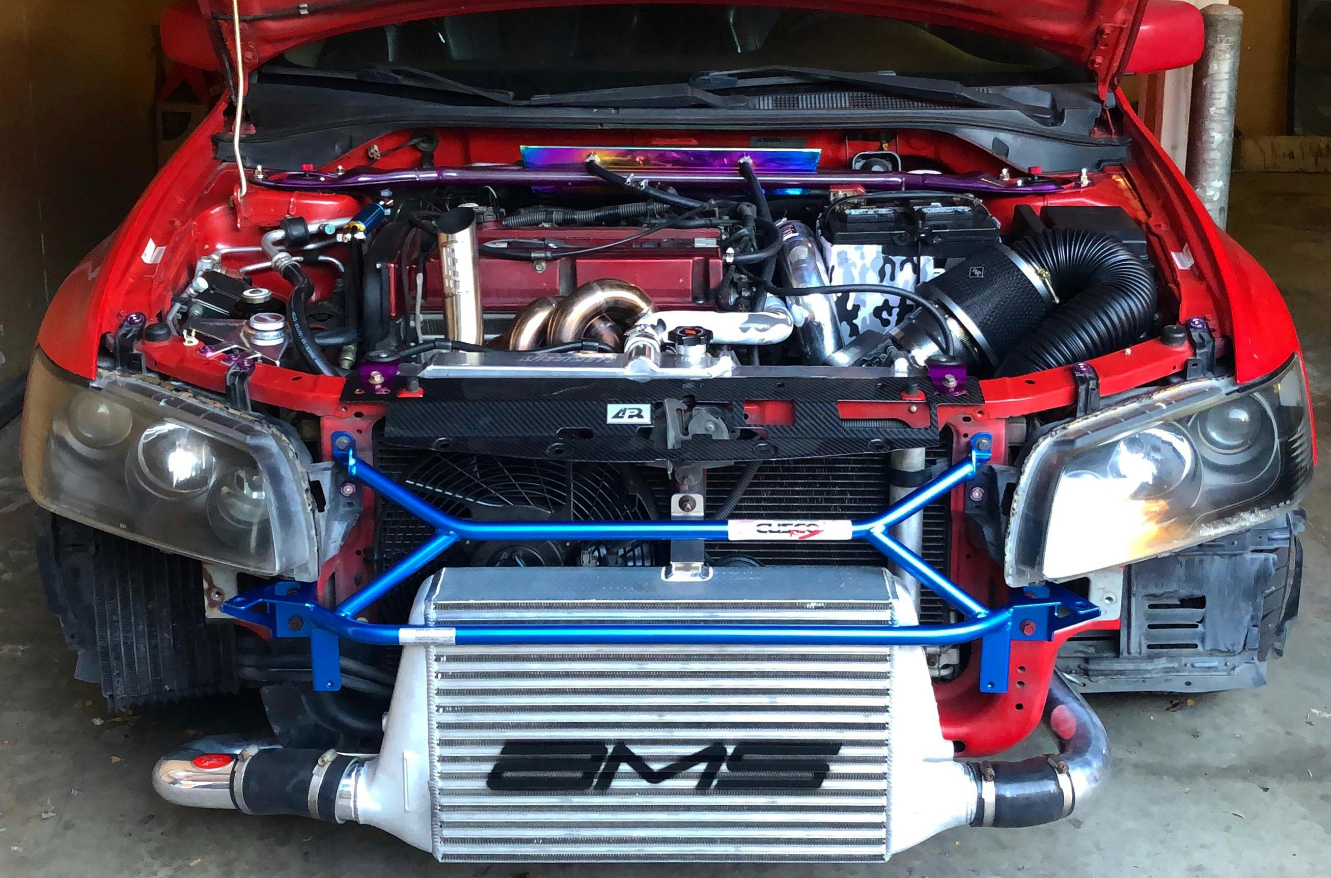 AMS Front Mount Intercooler w/ Logo 20032007 Mitsubishi Evo 8 / 9